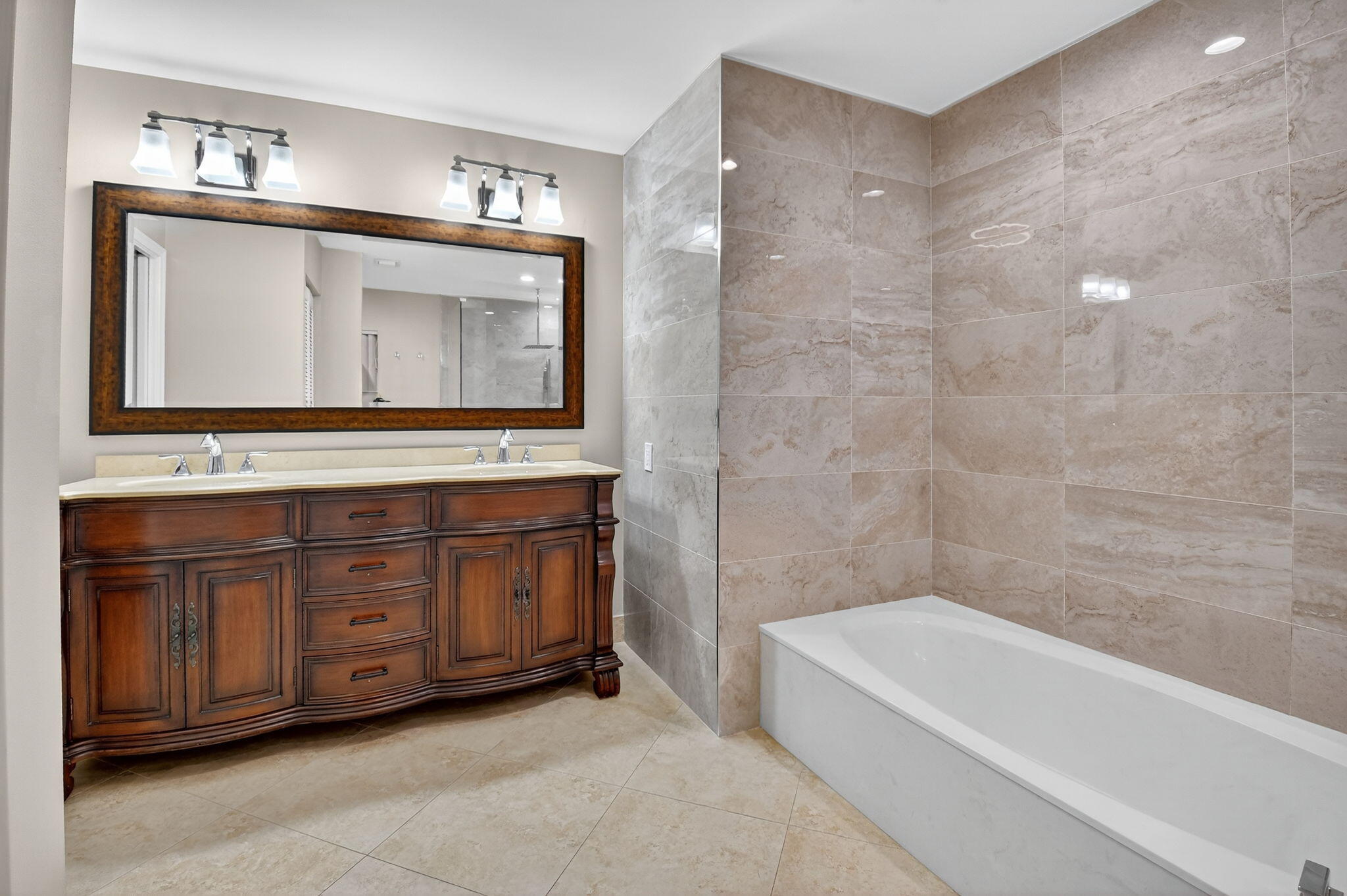 360 Northwest 53rd Street Boca Raton, FL 33487 - Photo 56 of 72 a bathroom with a bathtub sink and mirror