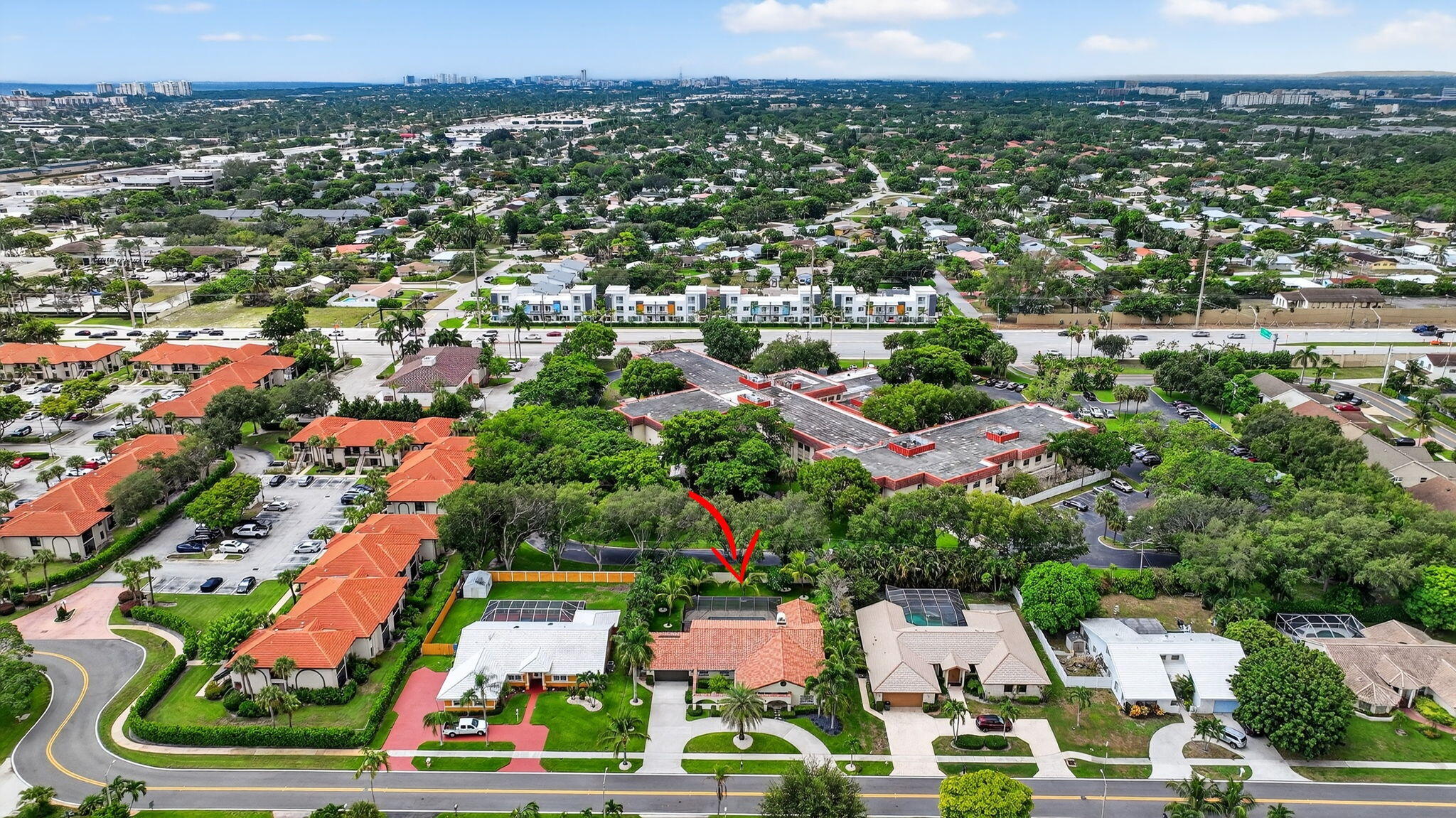 360 Northwest 53rd Street Boca Raton, FL 33487 - Photo 62 of 72 an aerial view of residential houses with outdoor space and swimming pool