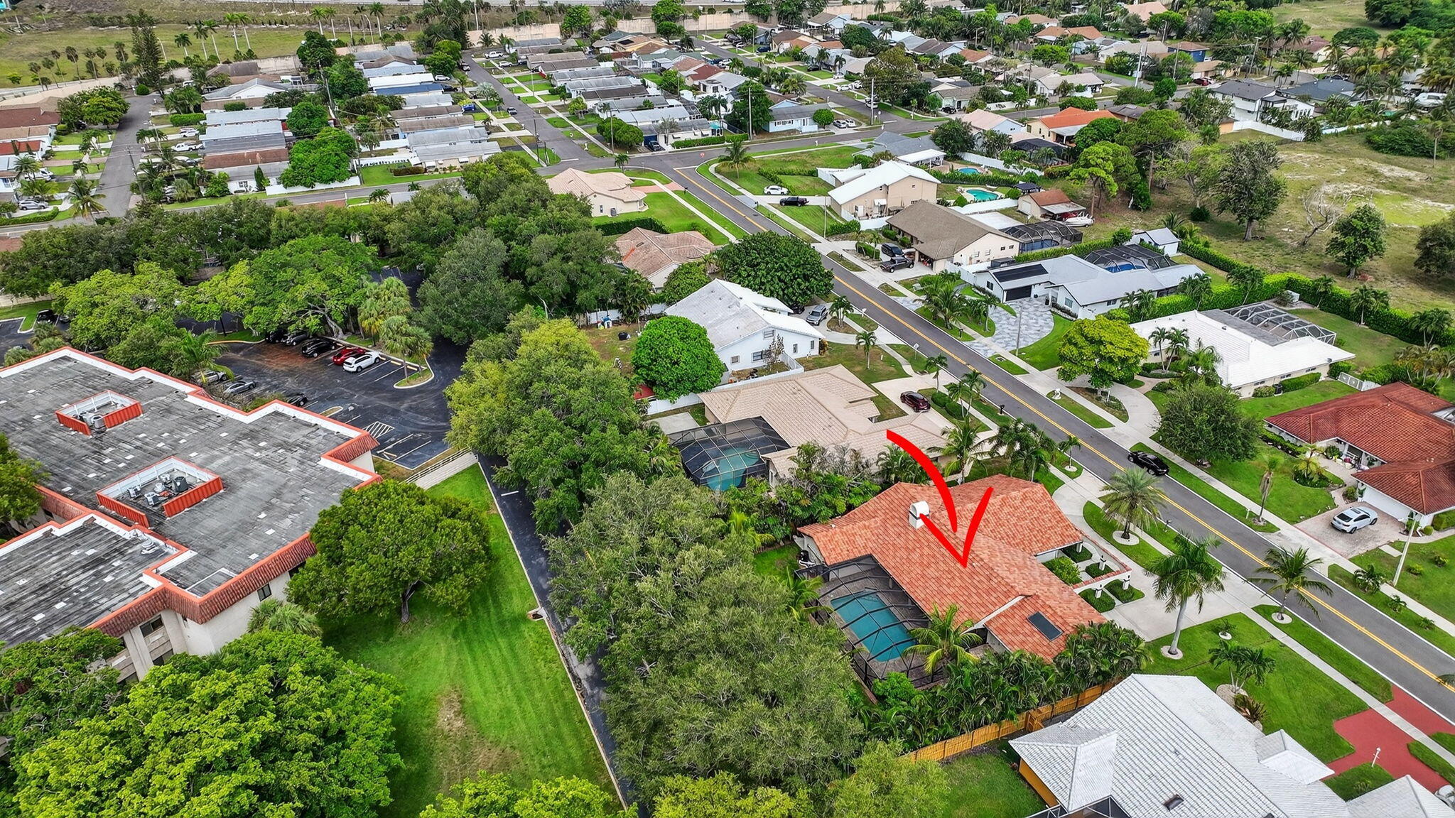 360 Northwest 53rd Street Boca Raton, FL 33487 - Photo 68 of 72 an aerial view of residential houses with outdoor space and trees all around