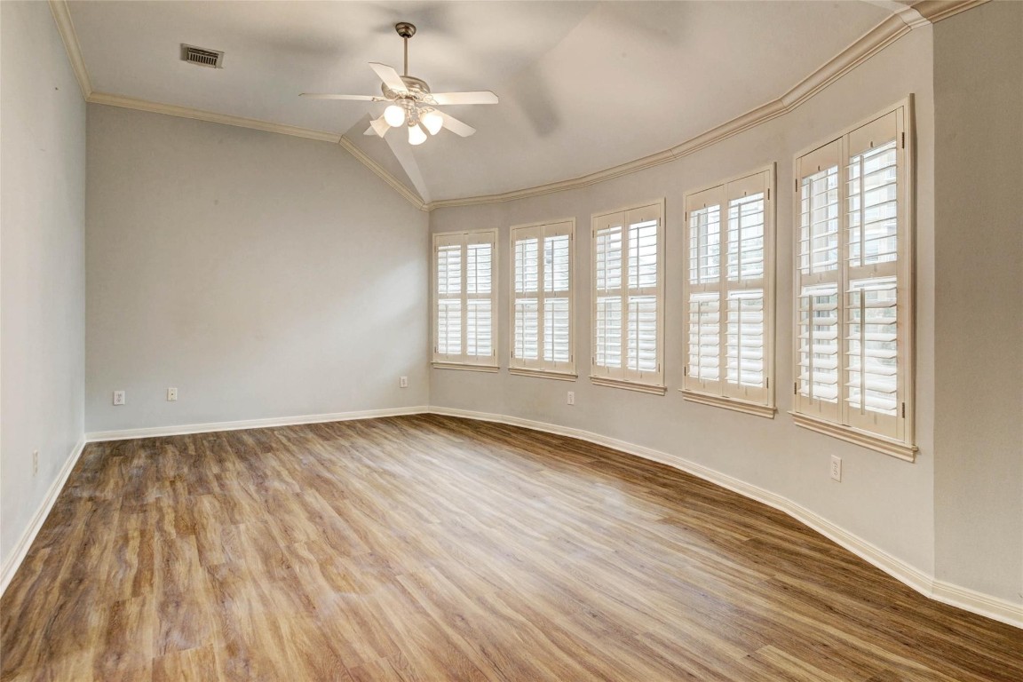 1012 Rochow Street Houston, TX 77019 - Photo 13 of 16 wooden floor in an empty room with a window