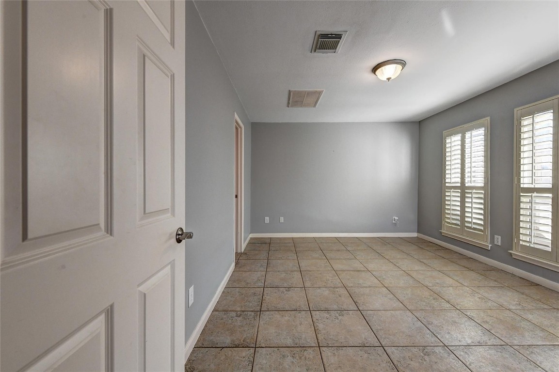 1012 Rochow Street Houston, TX 77019 - Photo 9 of 16 a view of an empty room and window