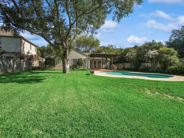 a view of a house with a big yard