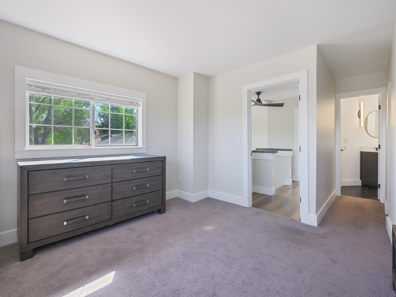 383 Explorer Court, Unit B Grand Junction, CO 81507 - Photo 23 of 40 a room with window and cabinet