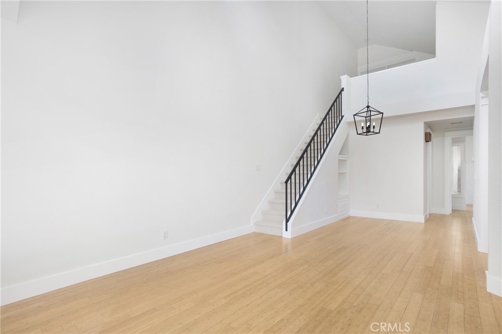 20006 Shamrock, Unit 10 Lake Forest, CA 92630 - Photo 19 of 25 a view of an entryway with wooden floor