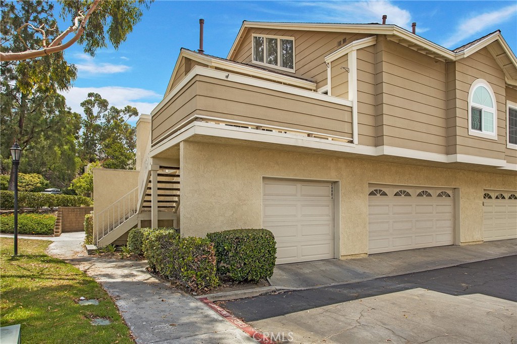 20006 Shamrock, Unit 10 Lake Forest, CA 92630 - Photo 22 of 25 a front view of a house