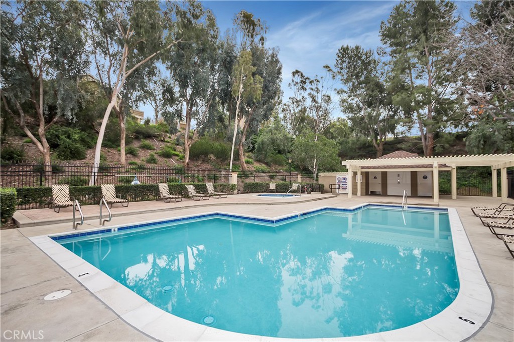 20006 Shamrock, Unit 10 Lake Forest, CA 92630 - Photo 25 of 25 a view of a house with swimming pool and sitting area