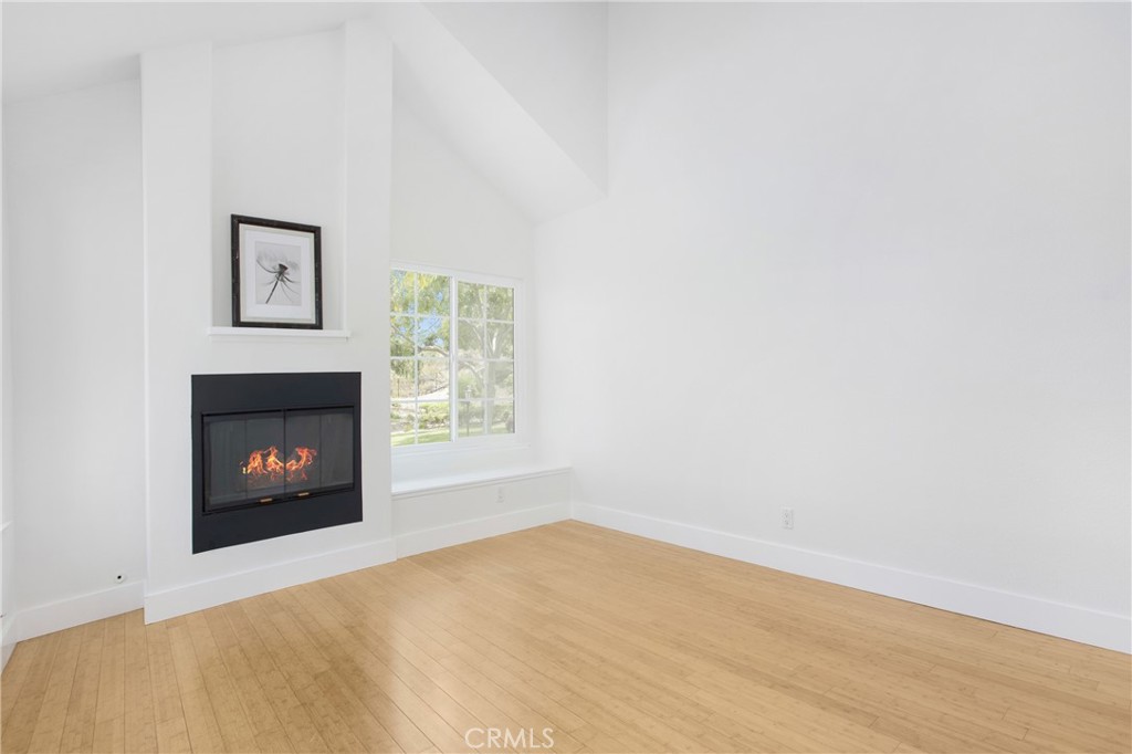 20006 Shamrock, Unit 10 Lake Forest, CA 92630 - Photo 4 of 25 a view of a room with window and fireplace