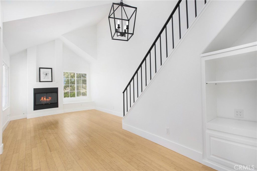 20006 Shamrock, Unit 10 Lake Forest, CA 92630 - Photo 5 of 25 a view of an entryway with wooden floor