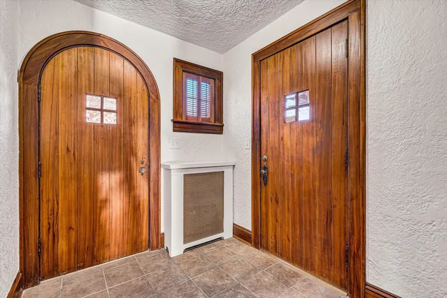 a view of an entryway with a door