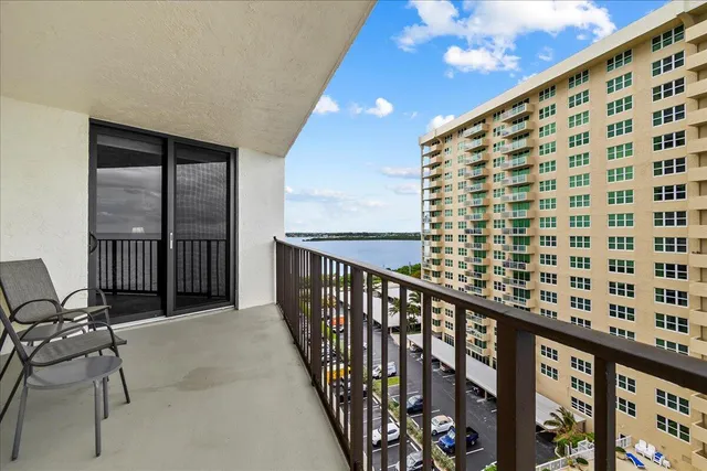 a view of balcony with furniture