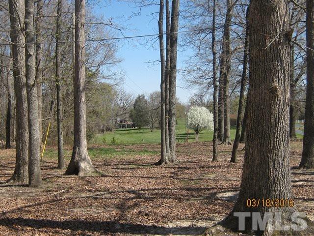 0 Hugh Blalock Road Roxboro, NC 27574 - Photo 2 of 17 a backyard of a house with lots of green space