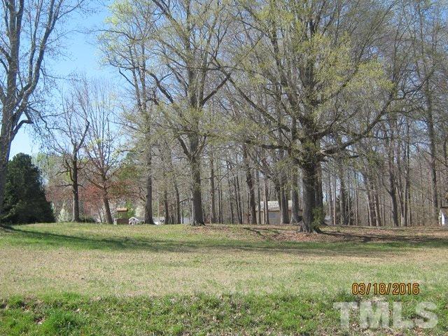 0 Hugh Blalock Road Roxboro, NC 27574 - Photo 8 of 17 a view of a yard with large trees