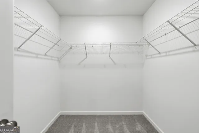 a view of a room with racks on the wall