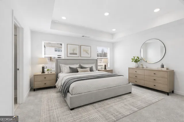 a bed room with a bed and a dresser