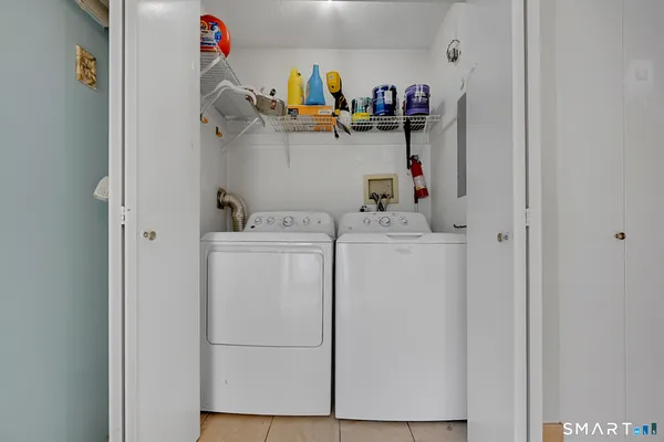 a utility room with dryer and washer
