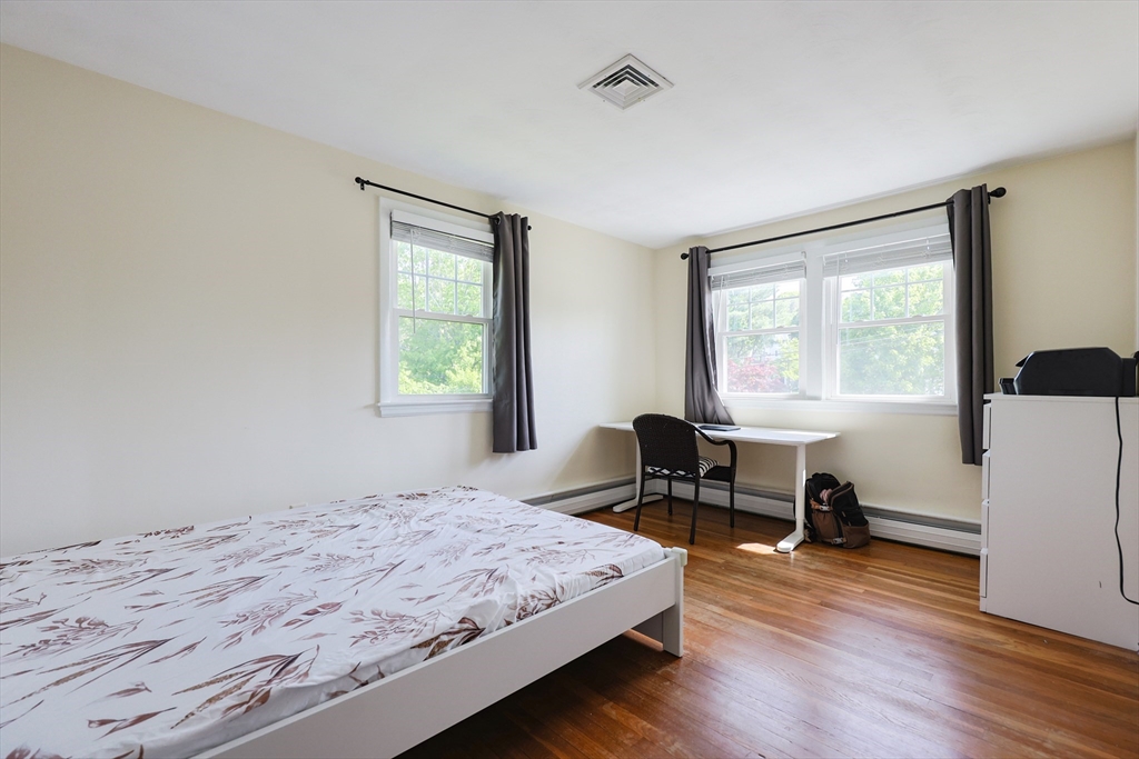 18 Tilden Road Canton, MA 02021 - Photo 12 of 30 a bedroom with a bed and a window