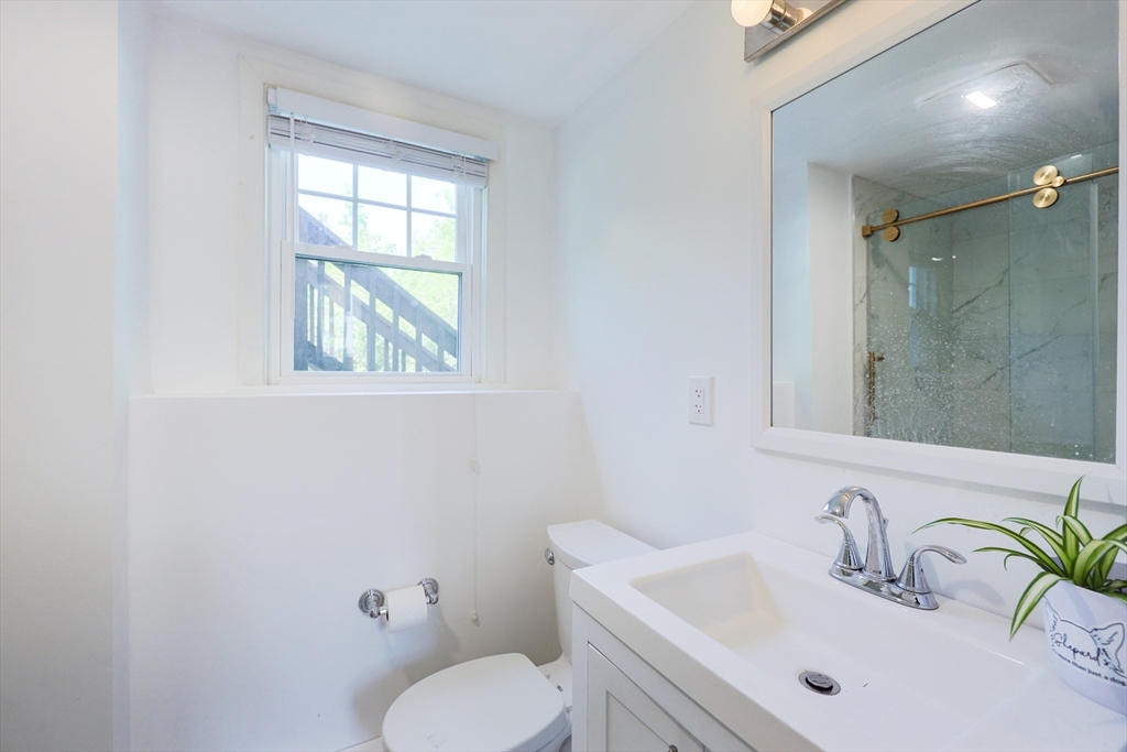 18 Tilden Road Canton, MA 02021 - Photo 17 of 30 a bathroom with a sink toilet and shower