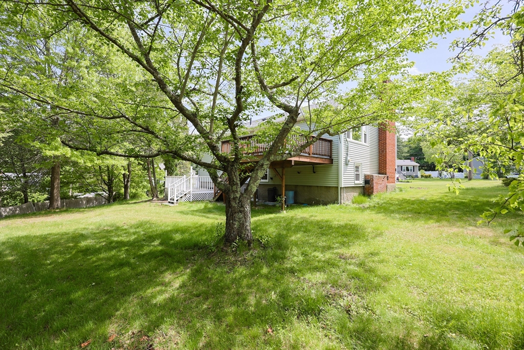18 Tilden Road Canton, MA 02021 - Photo 29 of 30 a view of a house with a large tree and a yard