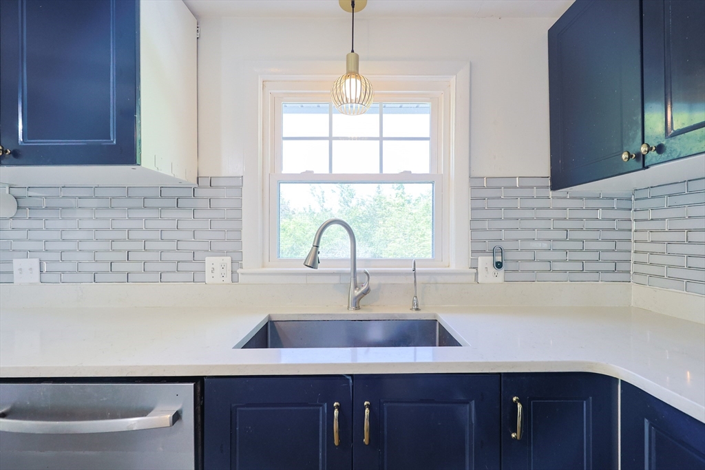 18 Tilden Road Canton, MA 02021 - Photo 7 of 30 a kitchen with a sink and a window