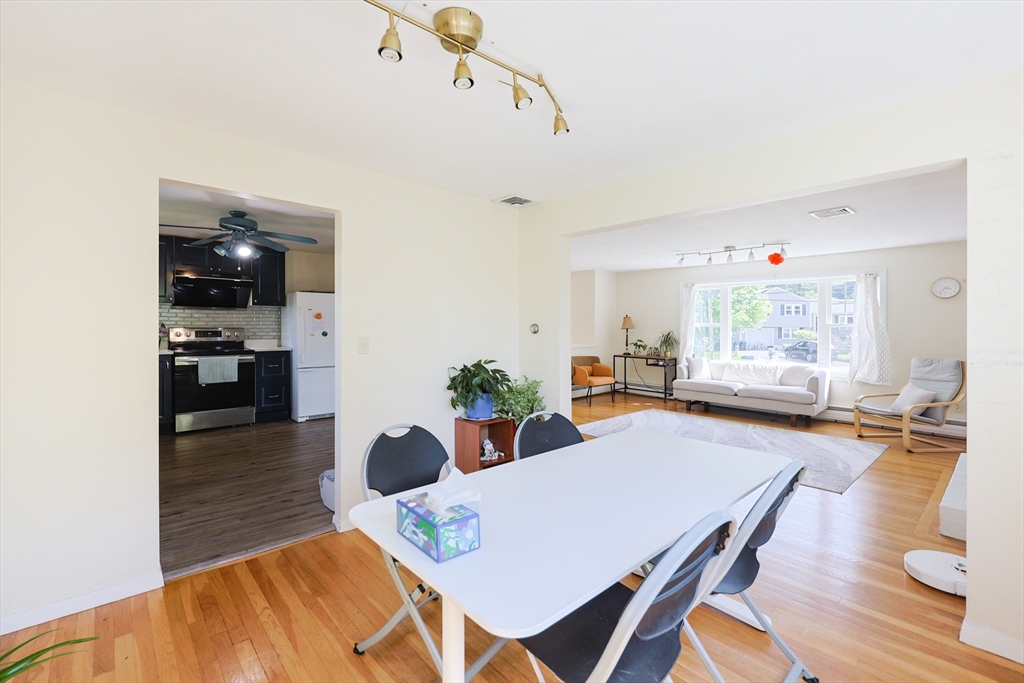 18 Tilden Road Canton, MA 02021 - Photo 9 of 30 a view of a dining room with furniture and wooden floor