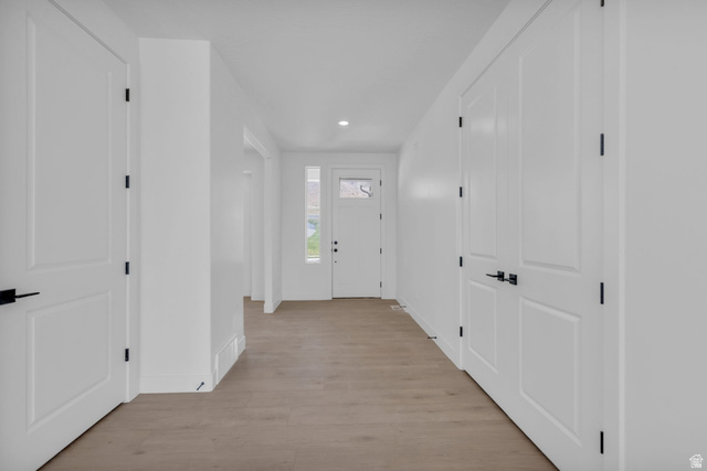 2821 Scarlet Road, Unit 149 Eagle Mountain, UT 84005 - Photo 5 of 28 Spacious entryway featuring 8' tall front door with transom window and sidelight.