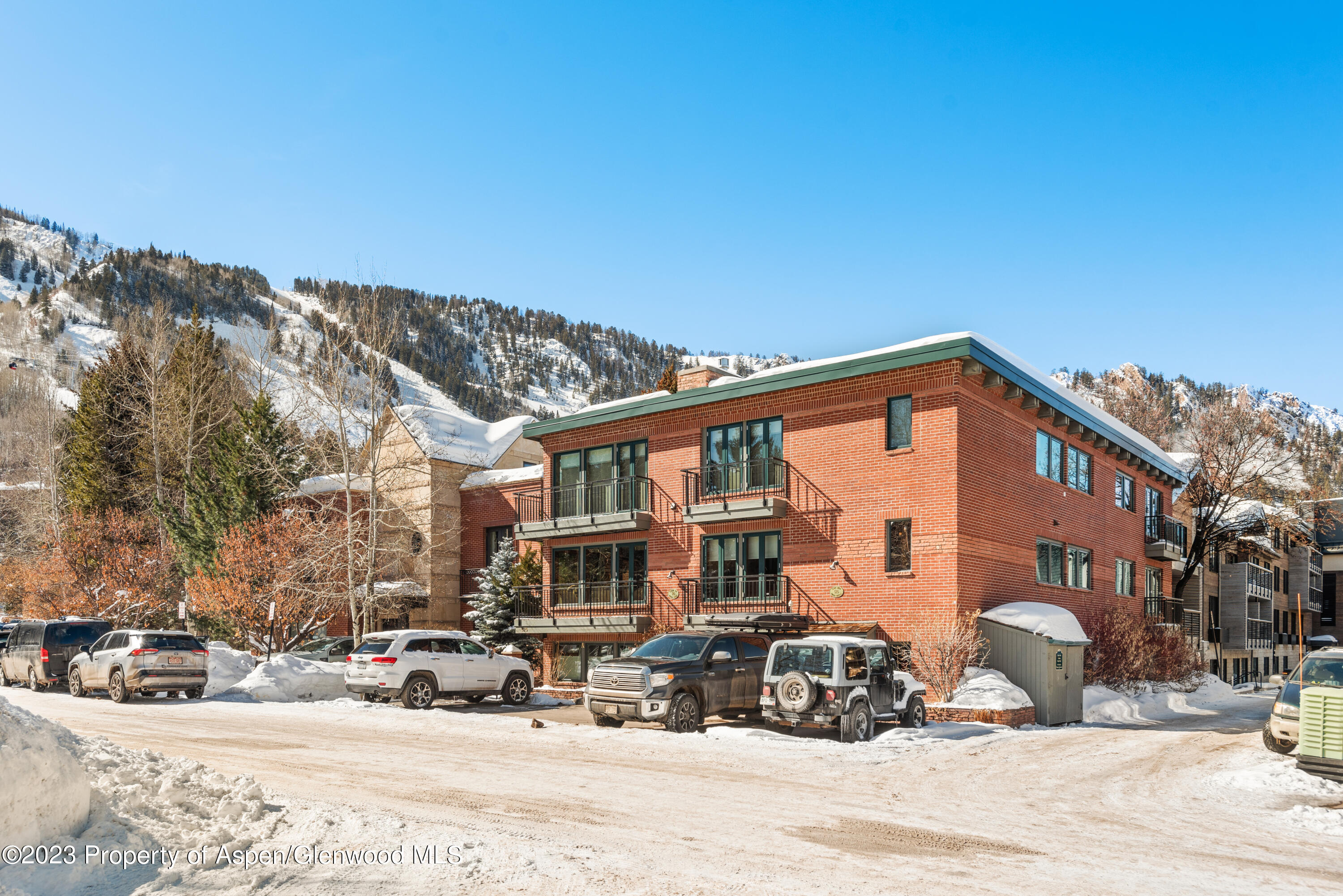 525 South Original Street, Unit B Aspen, CO 81611 - Photo 17 of 17 a street view with tall buildings and a street