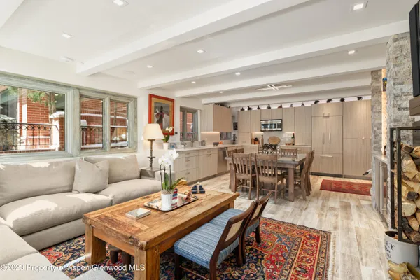 a living room with furniture and a table