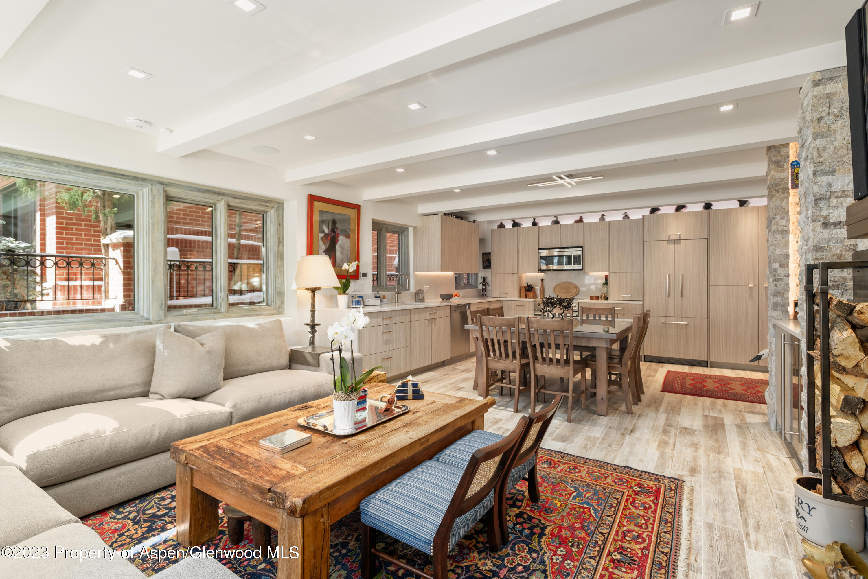 525 South Original Street, Unit B Aspen, CO 81611 - Photo 3 of 17 a living room with furniture and a table