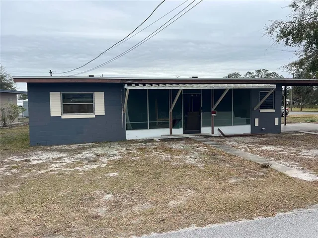 a view of outdoor space and front view of a house