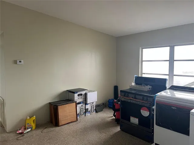 a room with furniture and a window