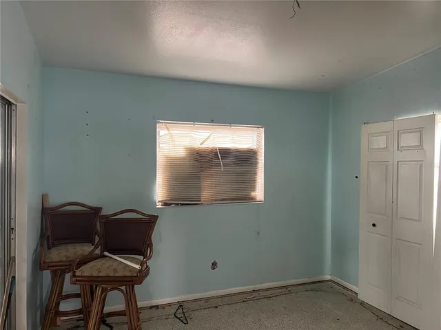 a room with furniture and a window