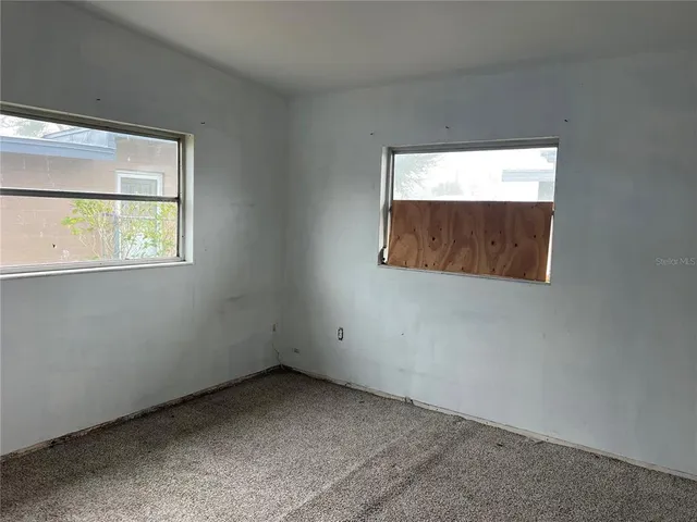 an empty room with a window
