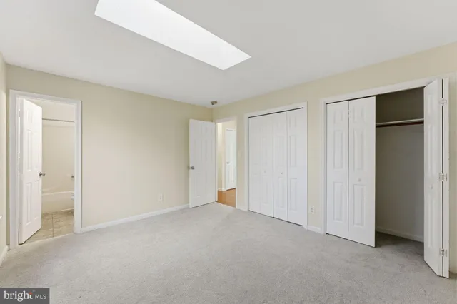 a bathroom with a sink toilet tub and shower