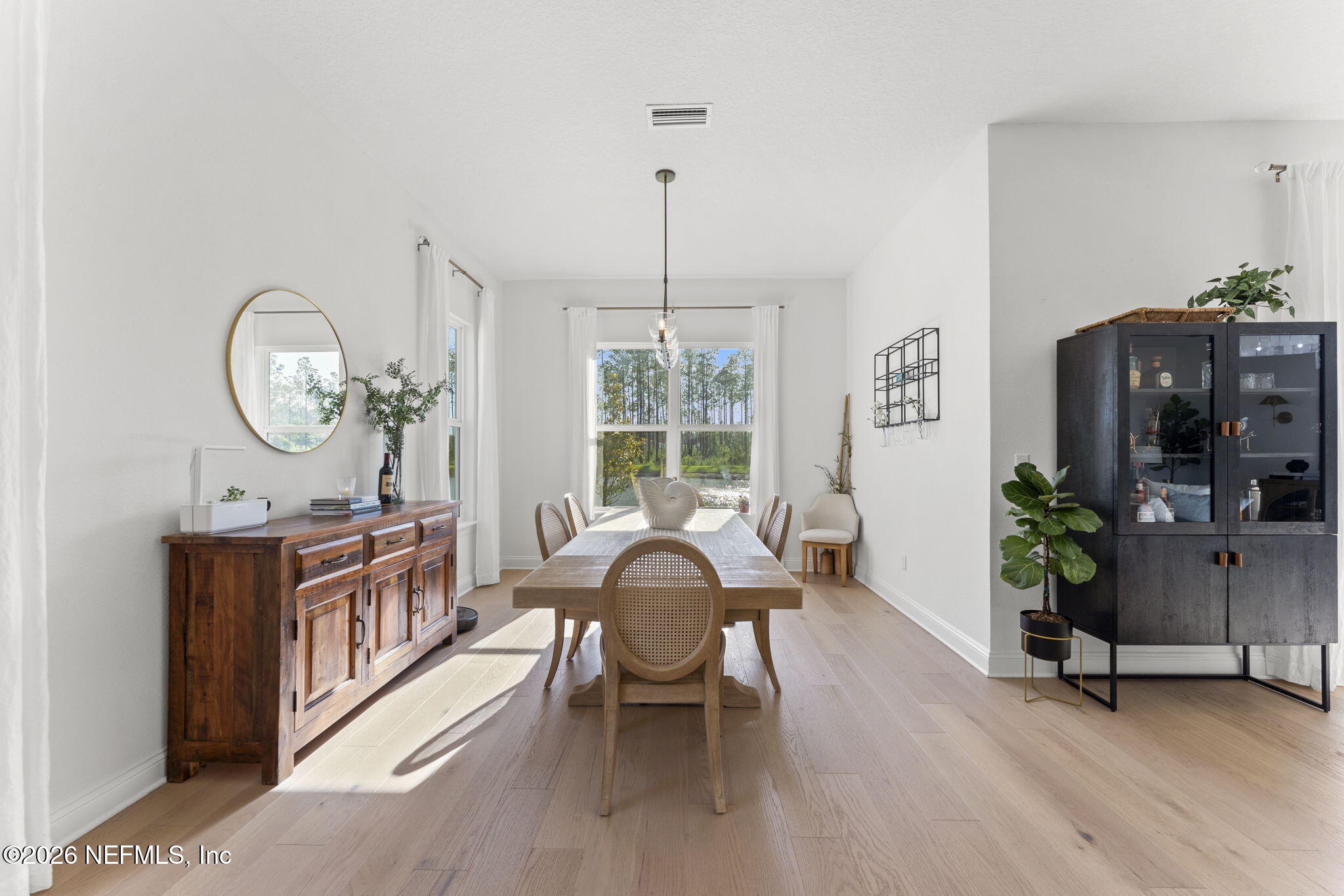 101 Elm Br Road St. Johns, FL 32259 - Photo 19 of 77 a view of a dining room with furniture window and wooden floor