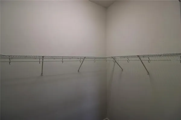 a view of a room with racks on the wall