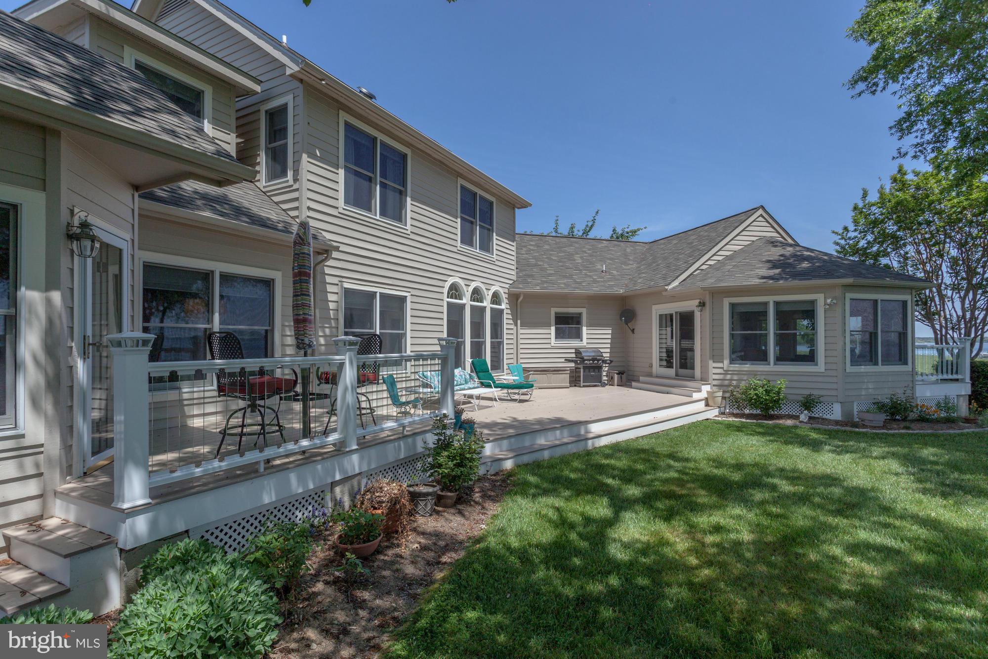 2815 Cox Neck Road Chester, MD 21619 - Photo 27 of 30 Beautiful wide decking for easy WF entertaining