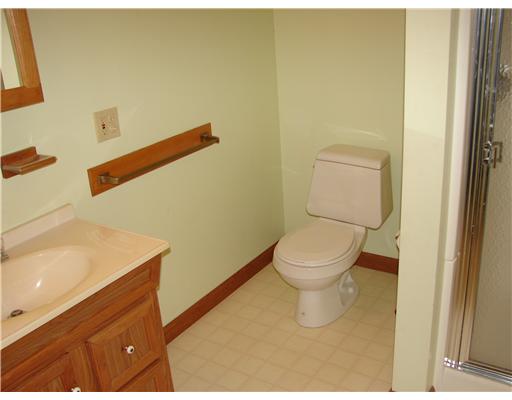 20 Newell Road Cranston, RI 02910 - Photo 13 of 20 Bathroom. Basement full bathroom! Located in a partially finished basement. One half of the basement is finished, the other half is designed for the home s mechanicals, utilities, and for storage. The half runs the length of the home.