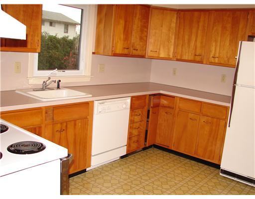 20 Newell Road Cranston, RI 02910 - Photo 6 of 20 Kitchen. Large kitchen. Fully applianced; dishwasher, stove,hood,refrigerator. Pride of ownership throughout this home!