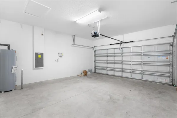 a kitchen with stainless steel appliances a sink stove and refrigerator