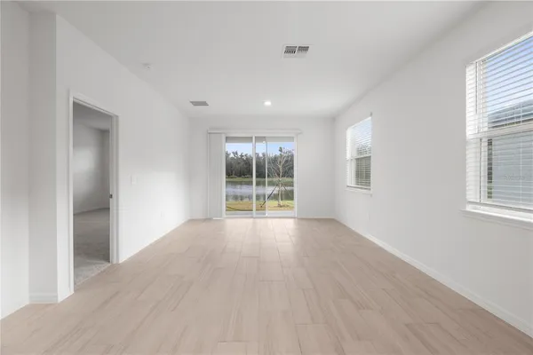 an empty room with windows