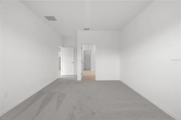 a view of a hallway with a shower