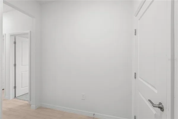 a view of a hallway with closet