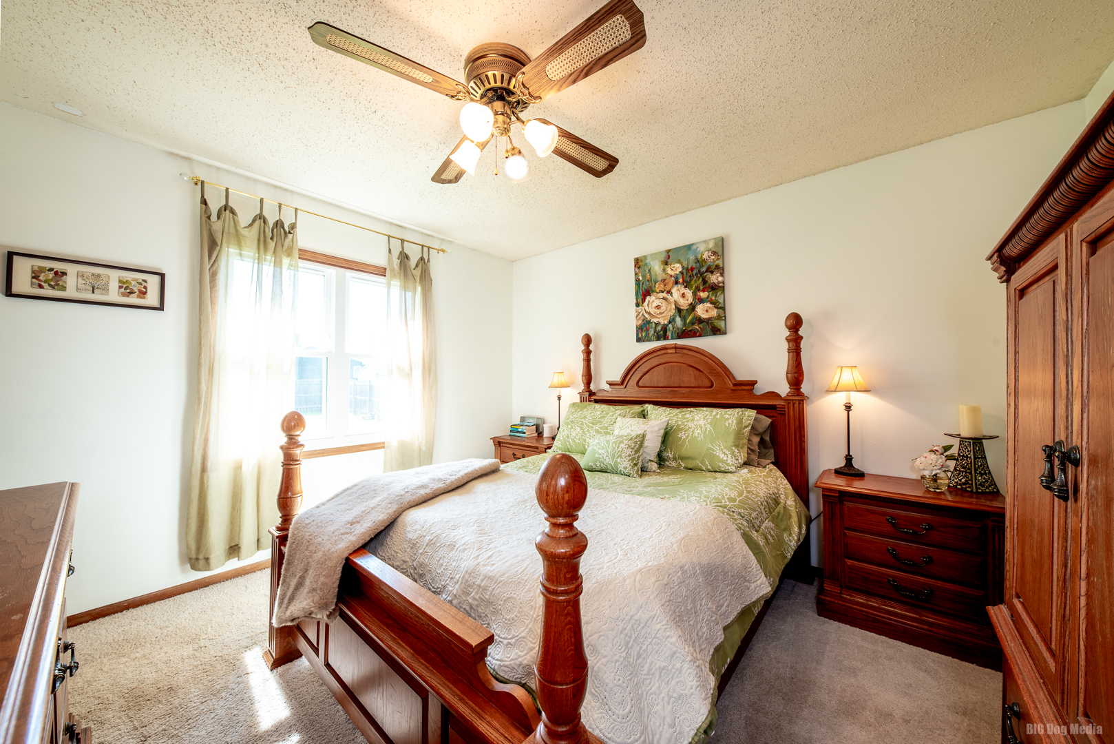 827 Independence Drive Bourbonnais, IL 60914 - Photo 12 of 25 a bedroom with a bed and wooden floor