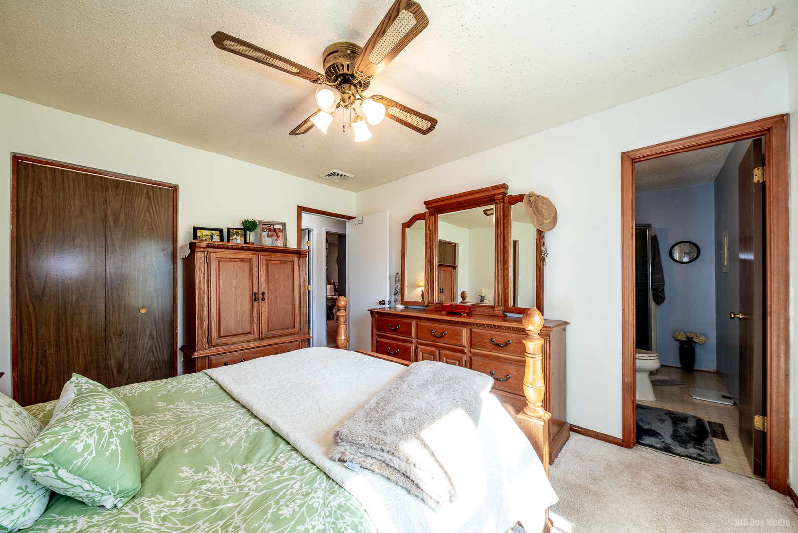 827 Independence Drive Bourbonnais, IL 60914 - Photo 13 of 25 a bedroom with a large bed and a chandelier