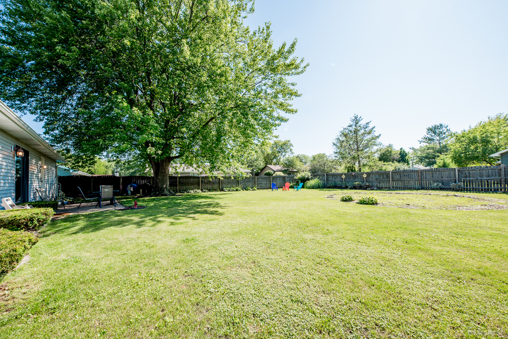 827 Independence Drive Bourbonnais, IL 60914 - Photo 23 of 25 a view of a swimming pool with a yard and trees