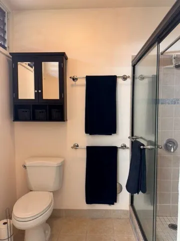 a view of a bathroom from a hallway