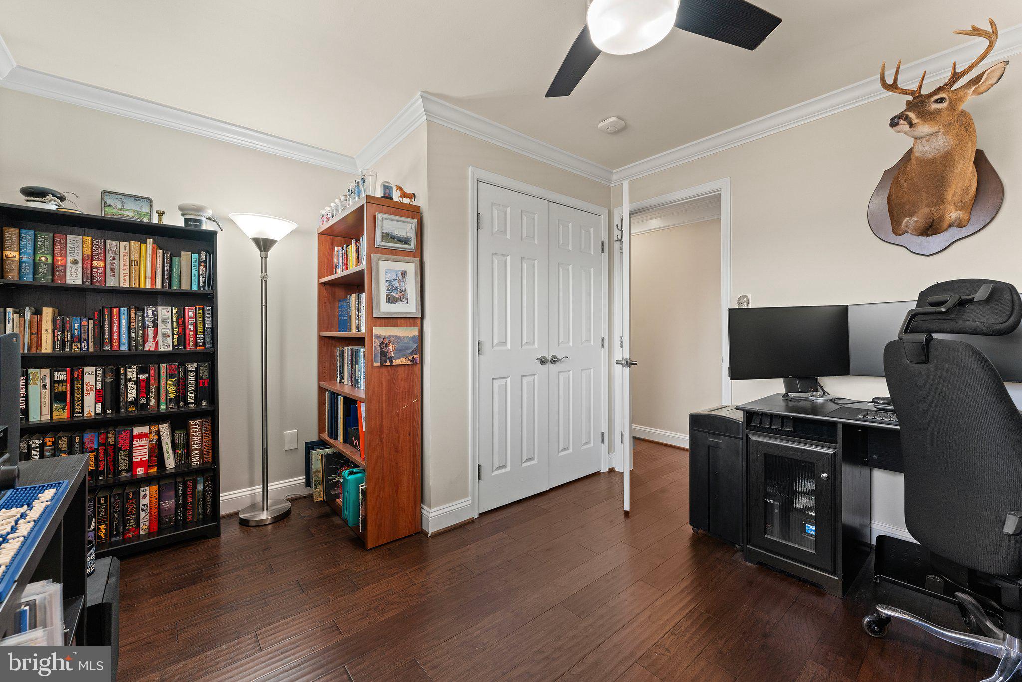 6408 Zekan Lane Springfield, VA 22150 - Photo 27 of 72 a view of a workspace with furniture and wooden floor