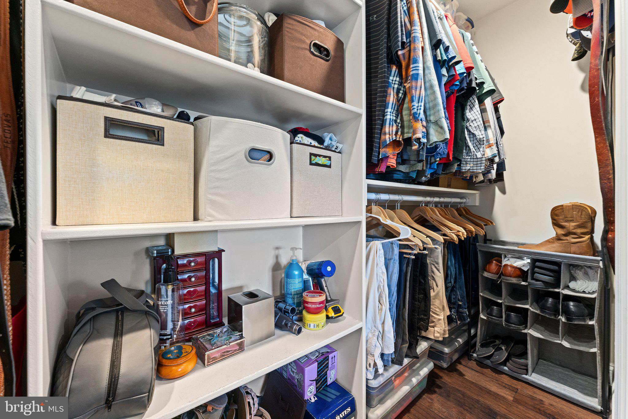 6408 Zekan Lane Springfield, VA 22150 - Photo 33 of 72 a view of walk in closet with clothes and shoes