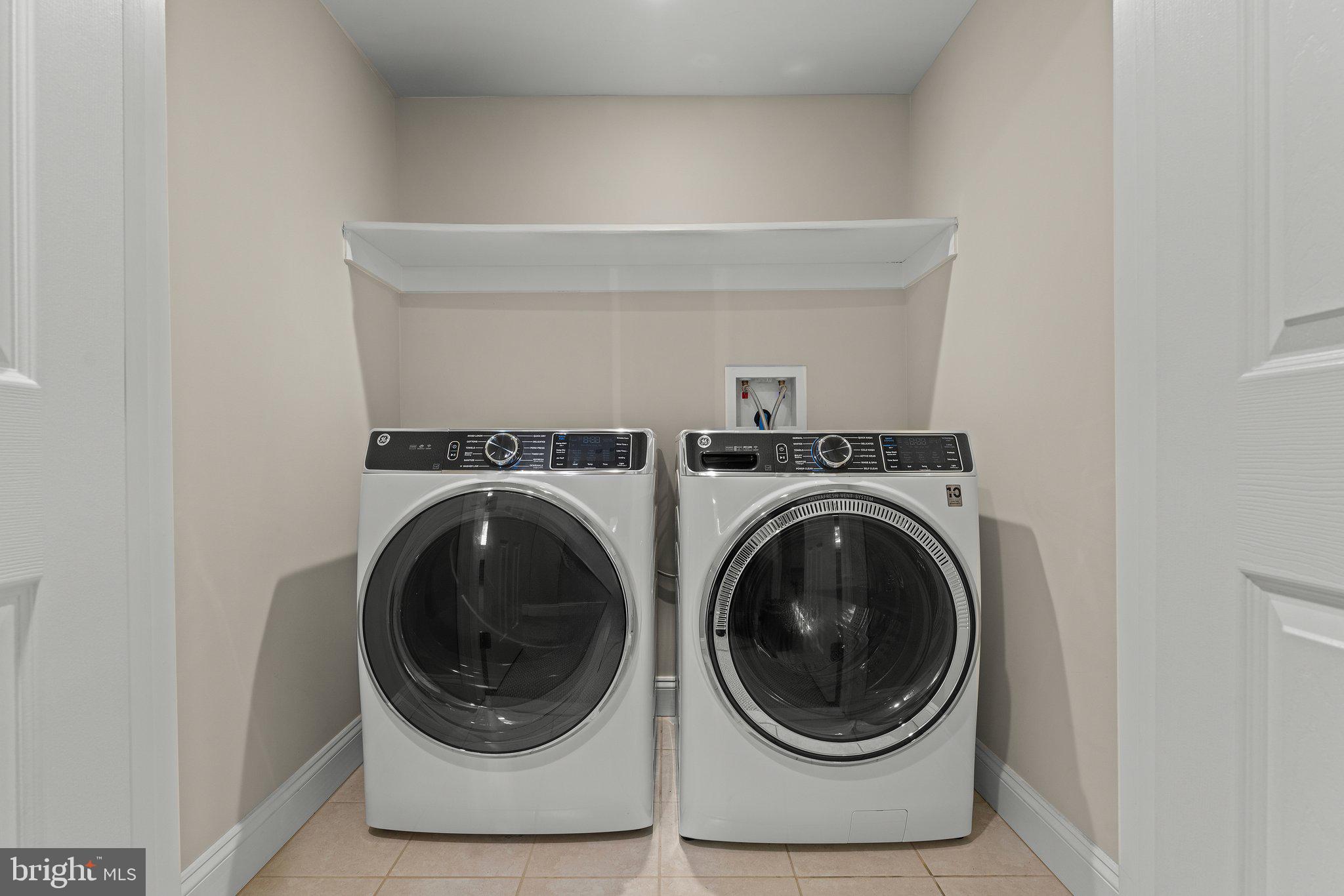 6408 Zekan Lane Springfield, VA 22150 - Photo 40 of 72 a utility room with dryer and washer