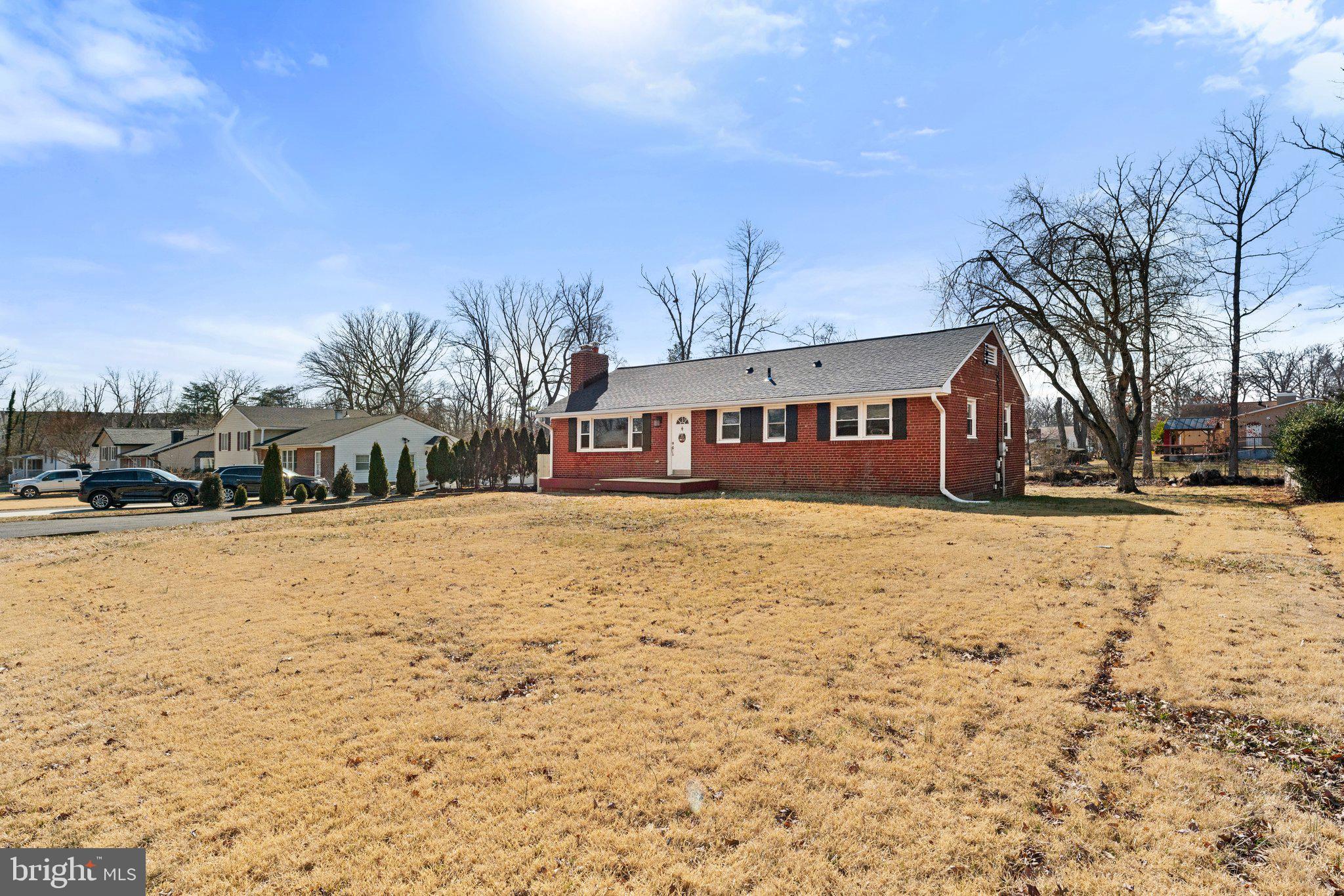 6408 Zekan Lane Springfield, VA 22150 - Photo 65 of 72 a view of large building with snow on the road